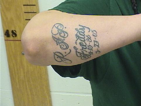 TATTOO ON RIGHT FOREARM/ELBOW