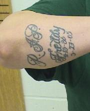 TATTOO ON RIGHT FOREARM/ELBOW